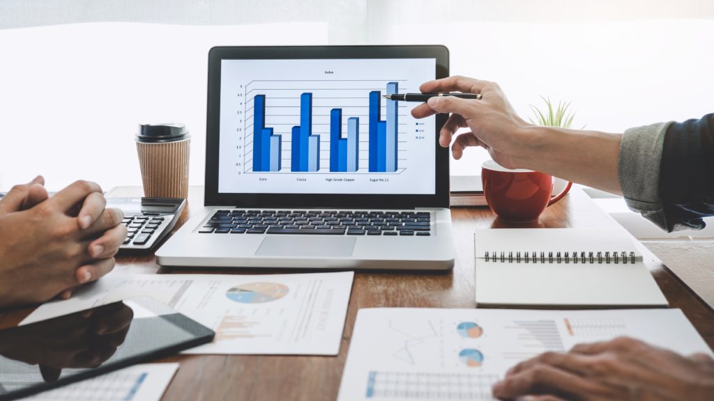 Business casual manager presenting and discussing company growth project success financial statistics, professional investor working start up project for strategy plan with document.